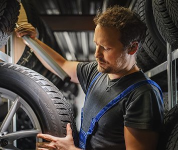  Hardworking,Experienced,Worker,Holding,Tire,And,He,Wants,To,Change