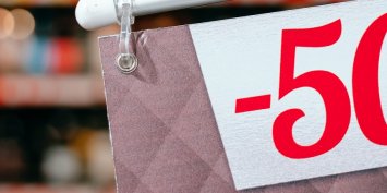 Tag with an inscription 50 percent discount, close view